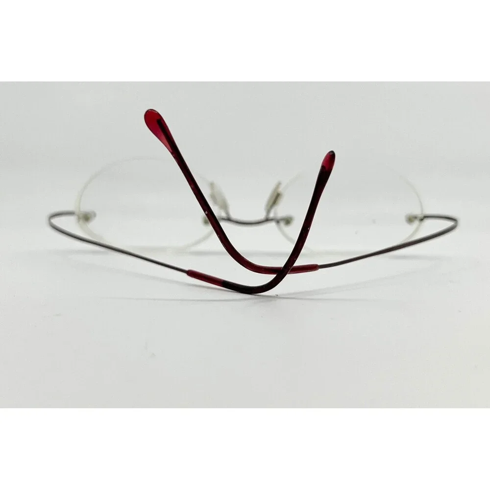 Dollar Optical Eyeglasses Unisex Red Beta Titanium Rimless Oval BT 2000 150
